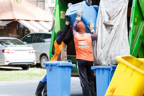 Professional garage clearance team at work